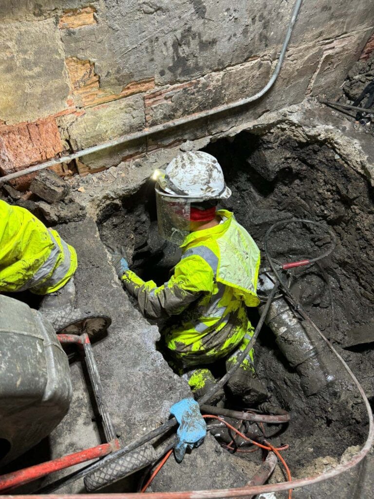 Interior access excavation at the front foundation wall (no
sidewalk excavation).
